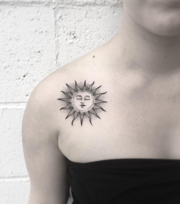 Sun tattoo by Justin Hobson