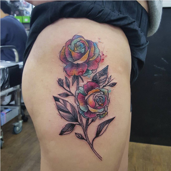 Colorful floral thigh piece by Cynthia Sobraty