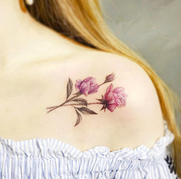 Roses on shoulder by Karin Tattoo