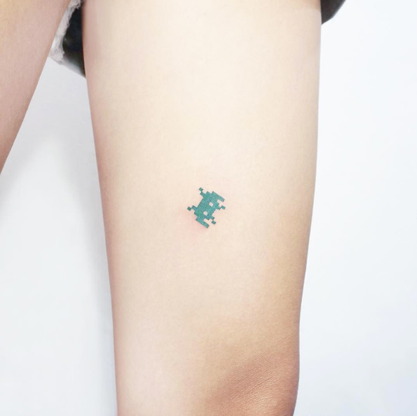 Space Invader tattoo by Heejae Jung