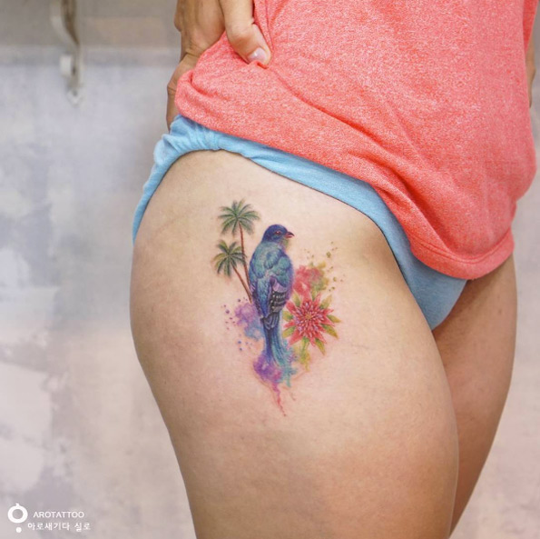 Cute upper thigh piece by Tattooist Silo