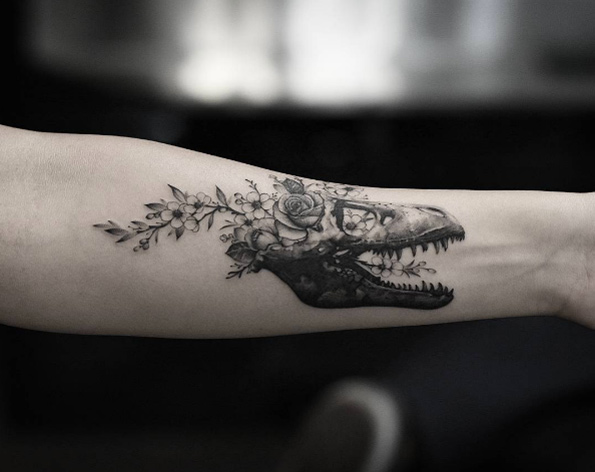 Dino skull by Drag Ink