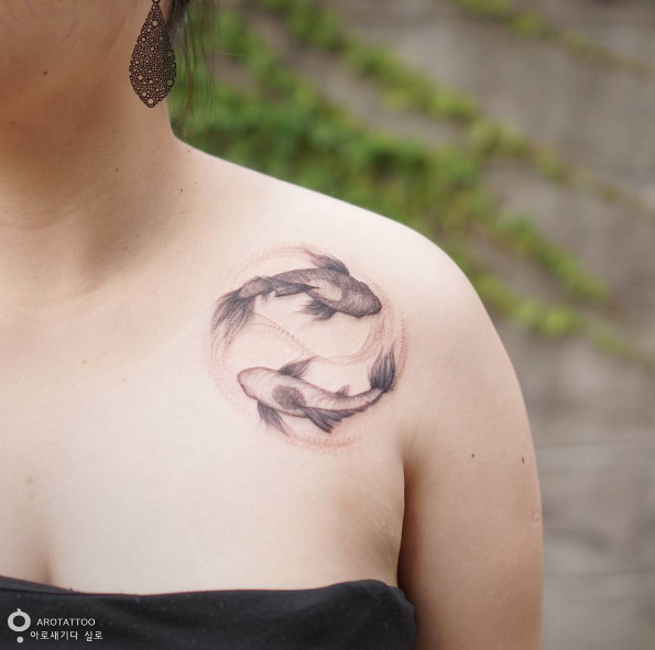 Yin yang koi tattoo by Tattooist Silo