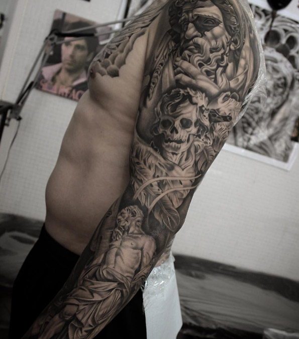 Black and grey ink sleeve by Shun Tattoo