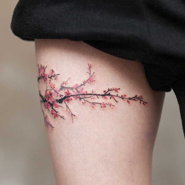 Cherry blossom branch by Tattooist River