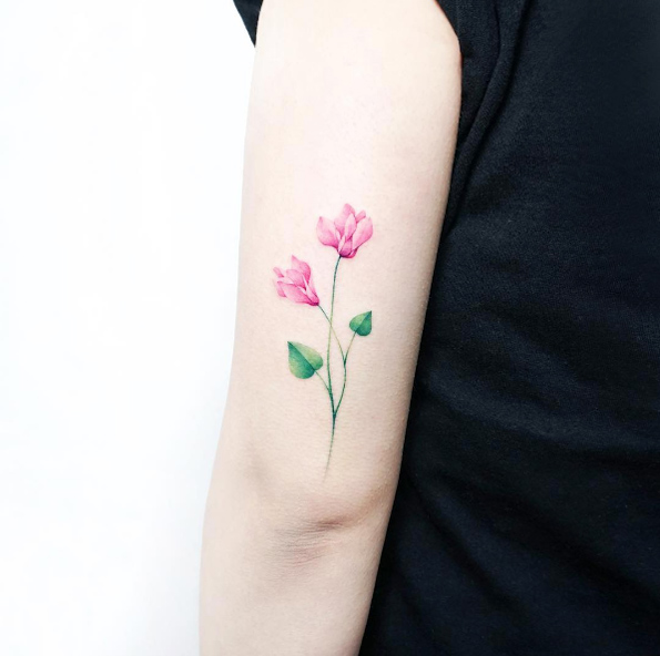 Pink flowers by Tattooist IDA