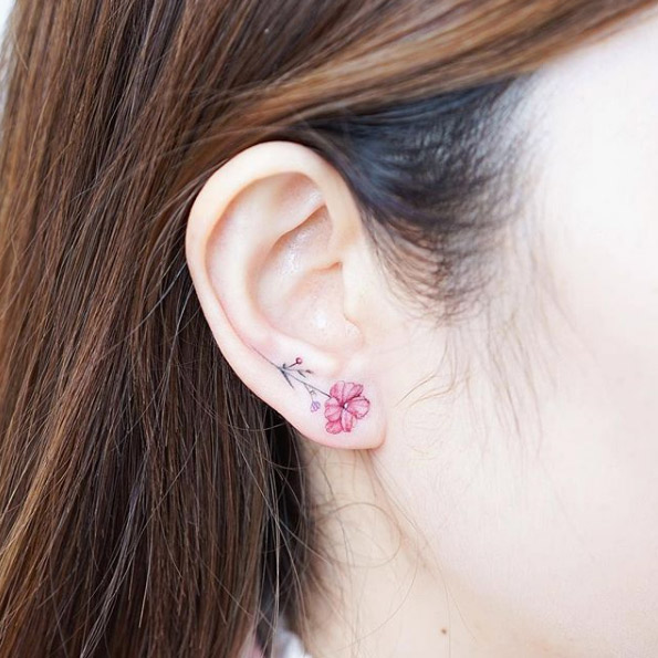 Floral earring by Mini Lau