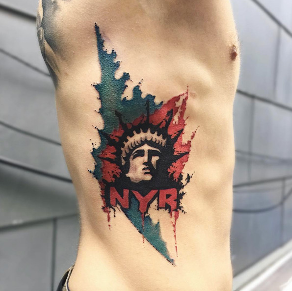 Stenciled Statue of Liberty tattoo by June Jung