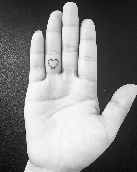 Heart tattoo by Goun