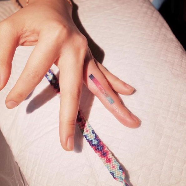 Gradient finger tattoo by Witty Button