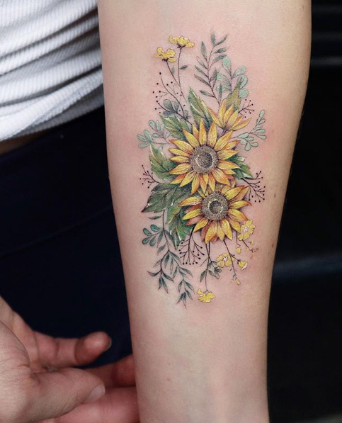 Floral forearm piece by Eva Karabudak