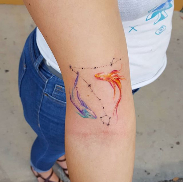 Pisces tattoo by Lola