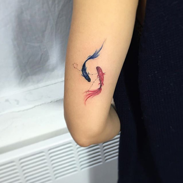 Pisces tattoo by Muha