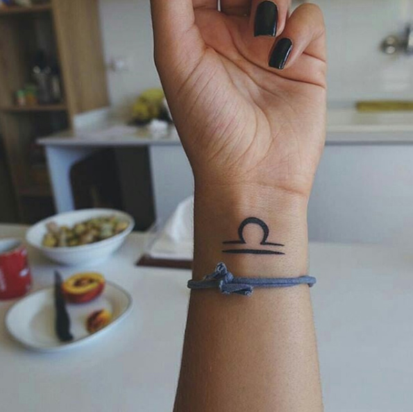 Libra symbol on wrist by qq47wk