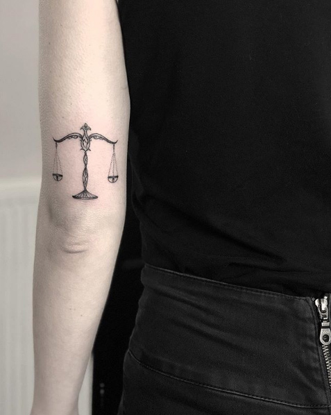 Libra scales of justice tattoo by Souljah D