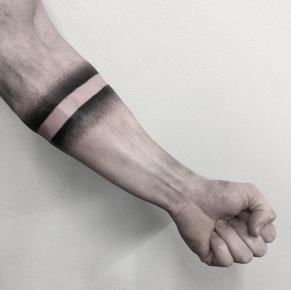 Negative space armband tattoo by G/O