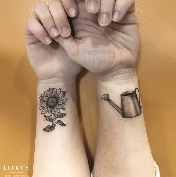 Mother daughter tattoos by Lucky's