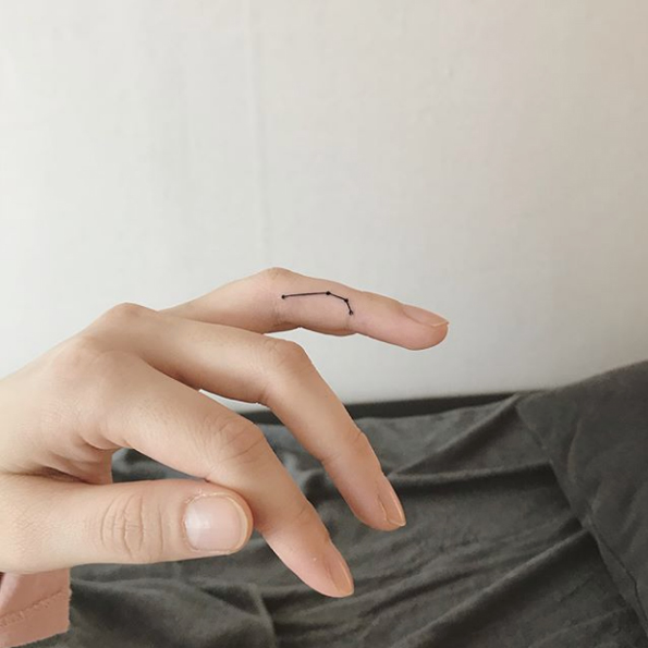Constellation finger tattoo by Up