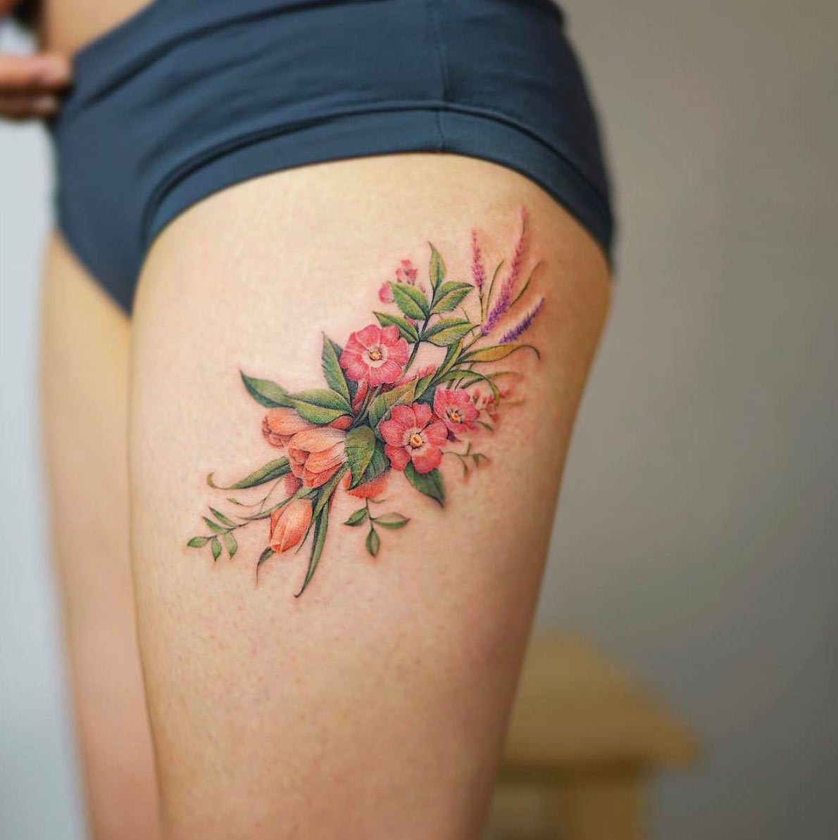 Floral thigh piece by Nando